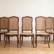 Set of 5 vintage caned chairs in classic style.