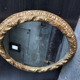 Gold oval mirror