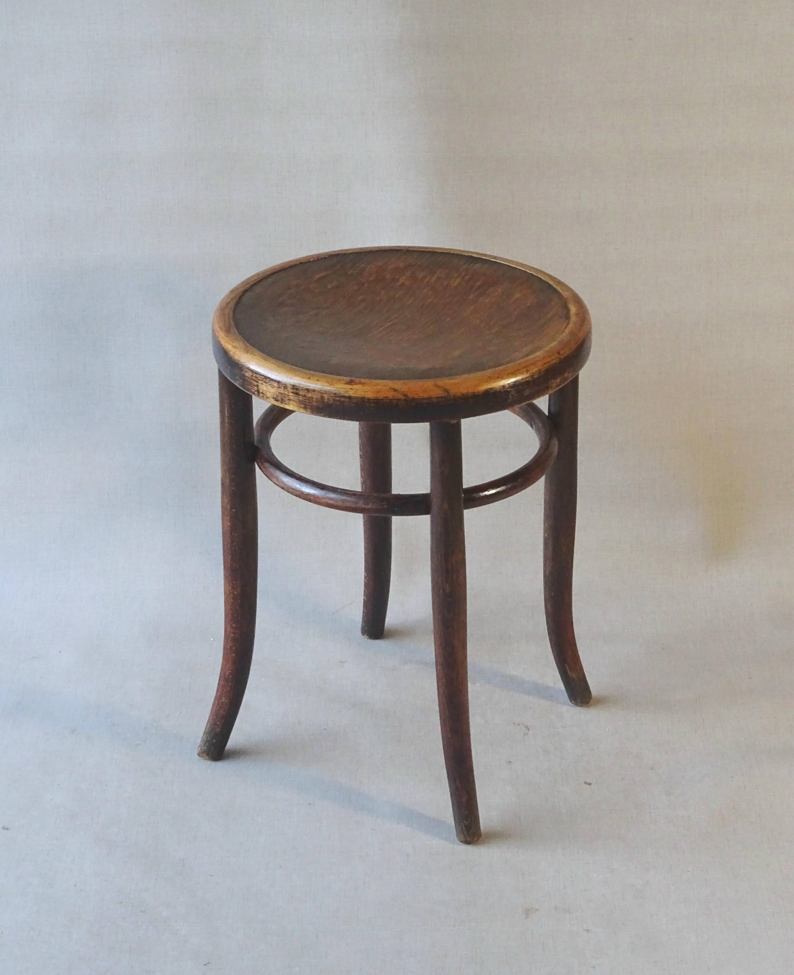 Fischel 1915 bistro stool, not Thonet, thermoformed seat.