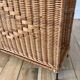 large wicker / rattan and black iron magazine rack from the 70s
