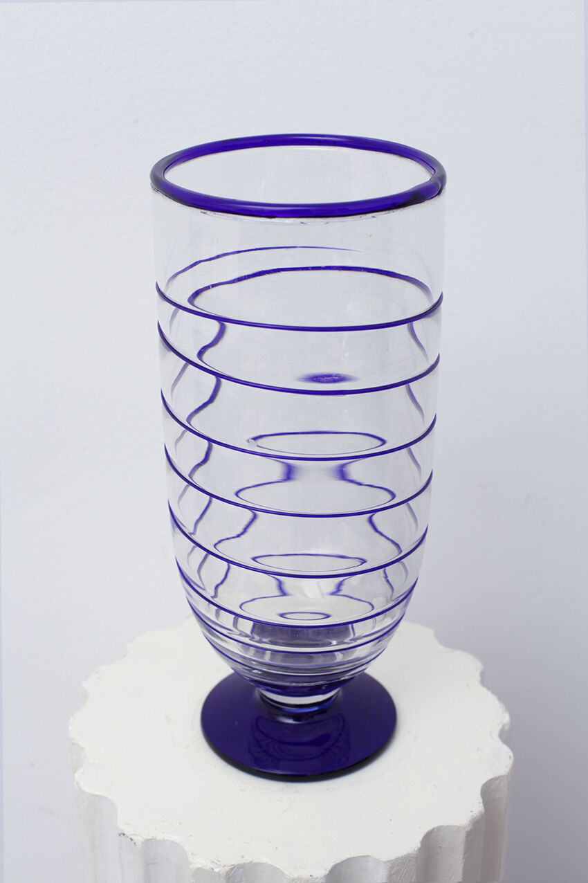Transparent Murano glass vase and blue net