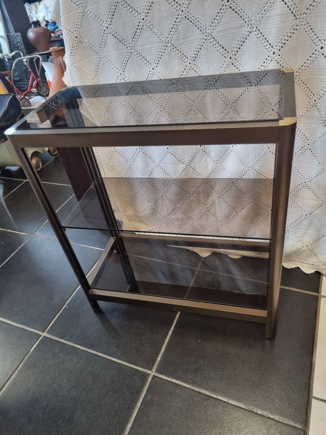 Vintage smoked glass console design