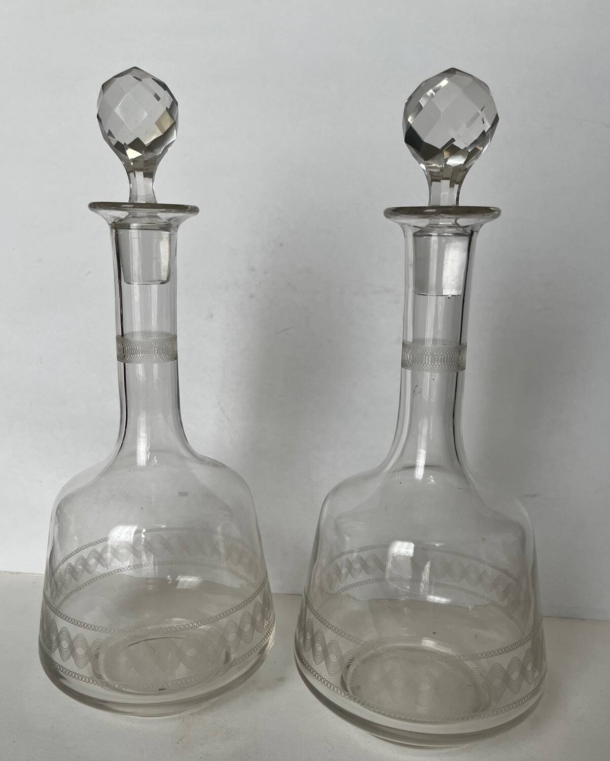Pair of engraved crystal decanters