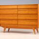 Vintage Czech chest of drawers U-453 by Jiří Jiroutek, 1960s, oak veneer, 110 × 45 × 77 cm