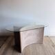 Italian side table with carved rattan and glass top.