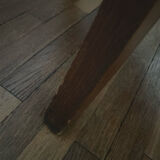 Low round art deco table in honey wood