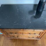 Antique wooden order with black marble top
