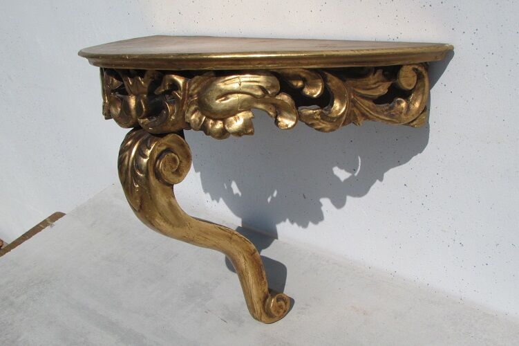 Wall console in gilded wood