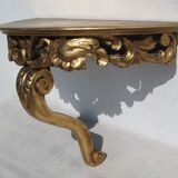 Wall console in gilded wood