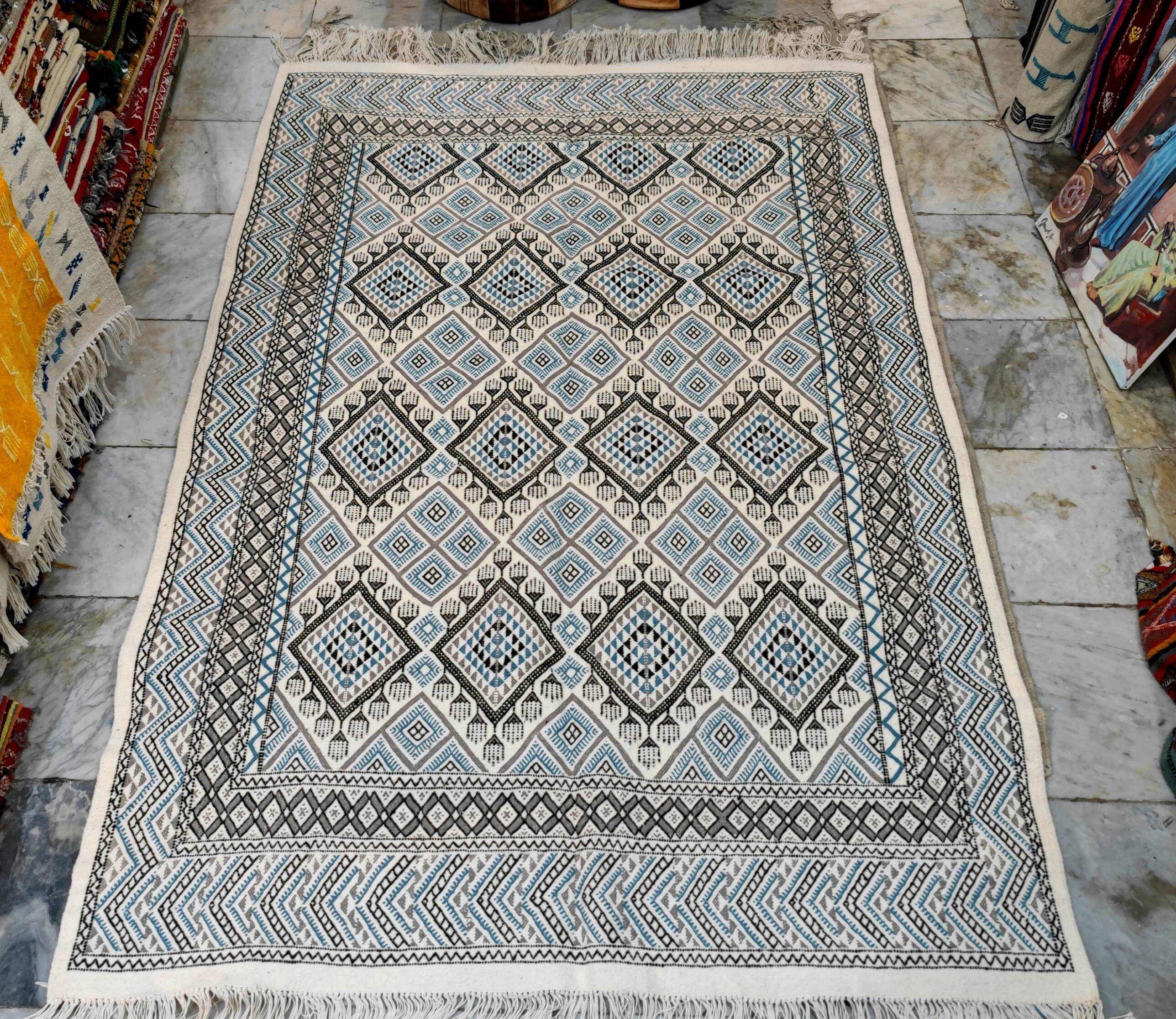 Hand-woven margoum rug in natural wool