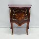 Marquetry chest of drawers with inlay in Louis XV style