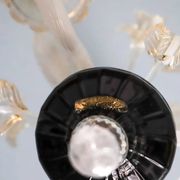 Small Venetian chandelier made of hand-blown Murano glass, lilac and pearlescent.
