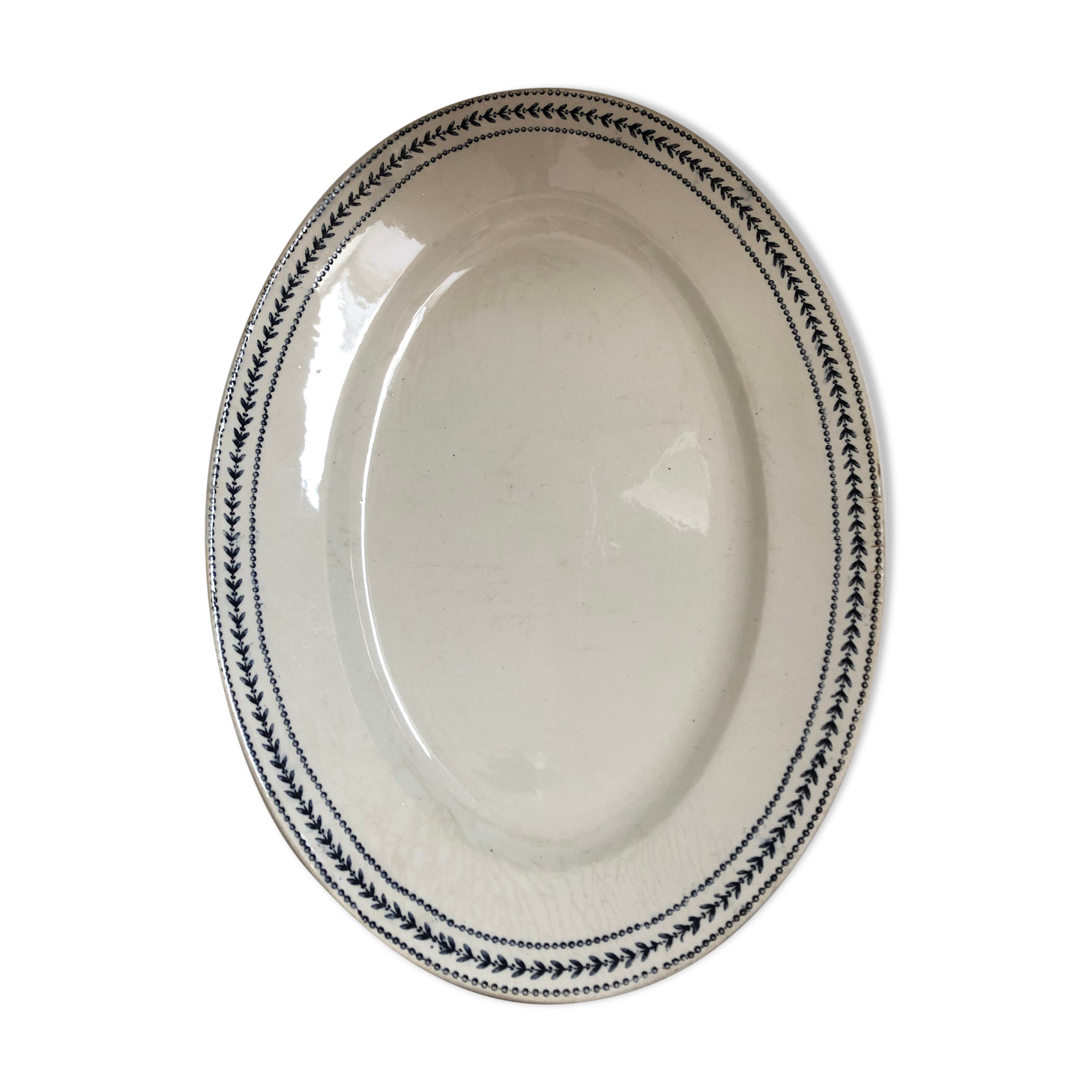 Plat ancien terre de fer modèle Lauriers