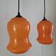 Pair of orange Opaline pendant lights, 1970s