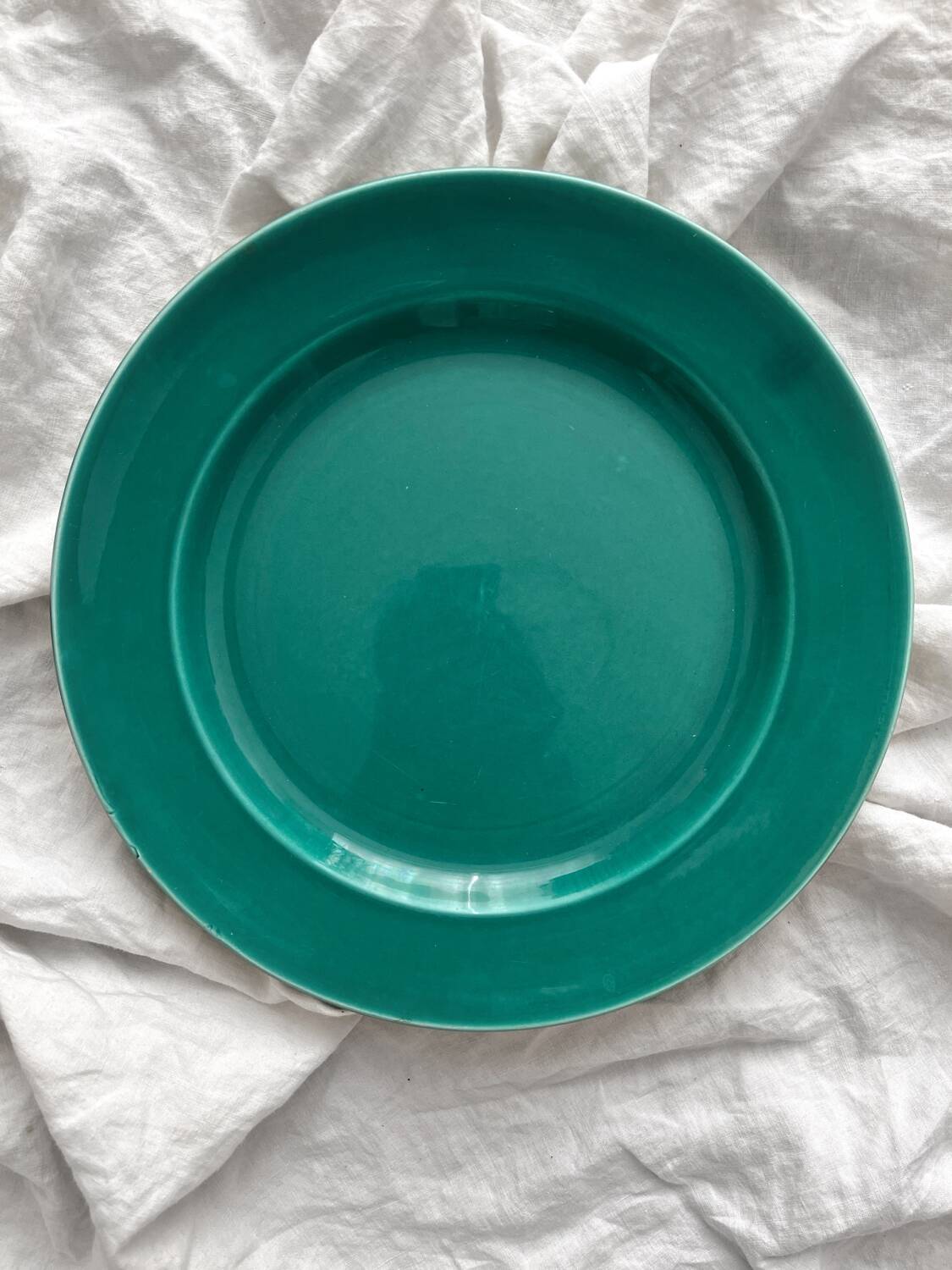 Vintage green round earthenware dish