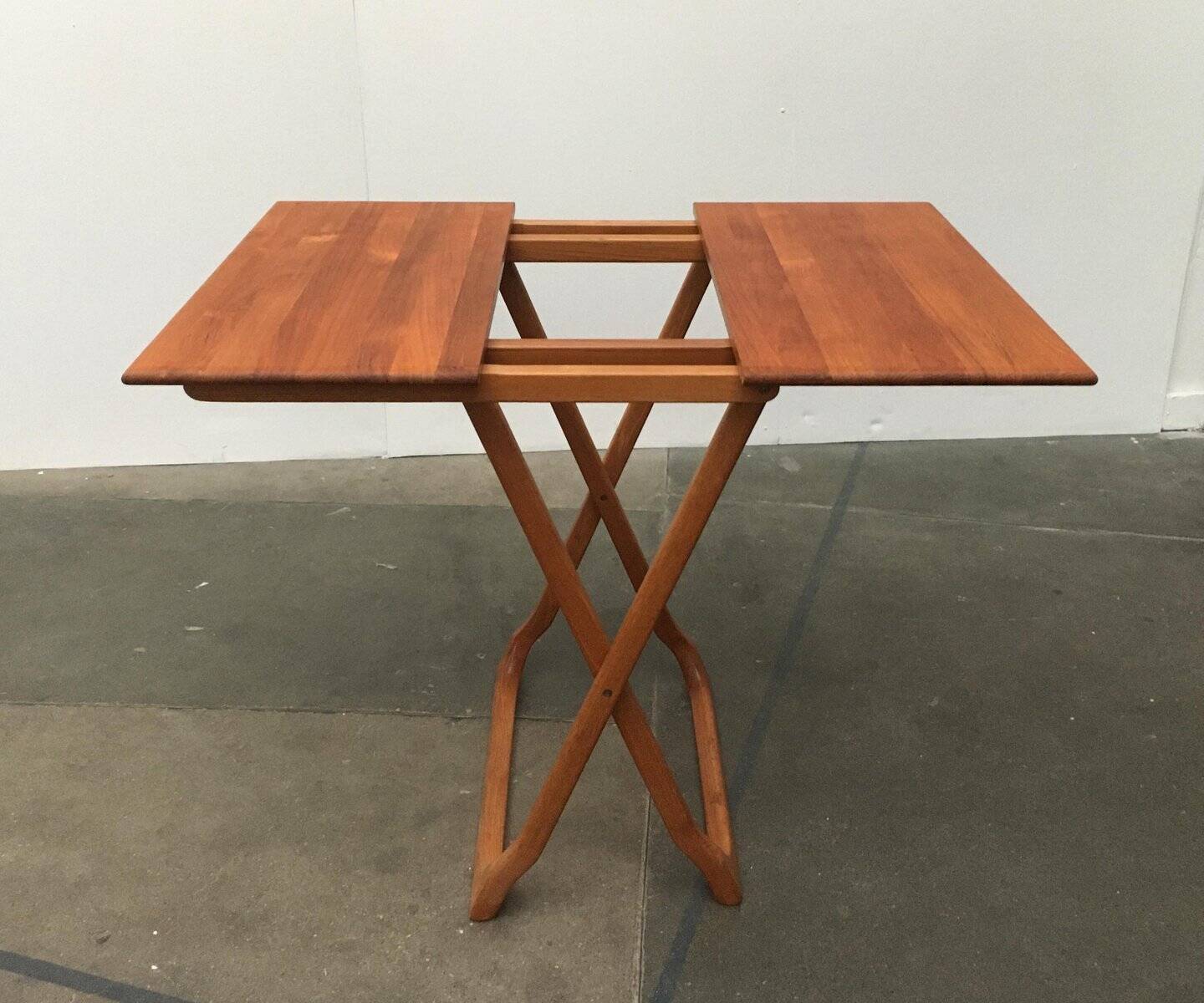 Danish folding table in teak from the mid-century by Juul Kristensen.