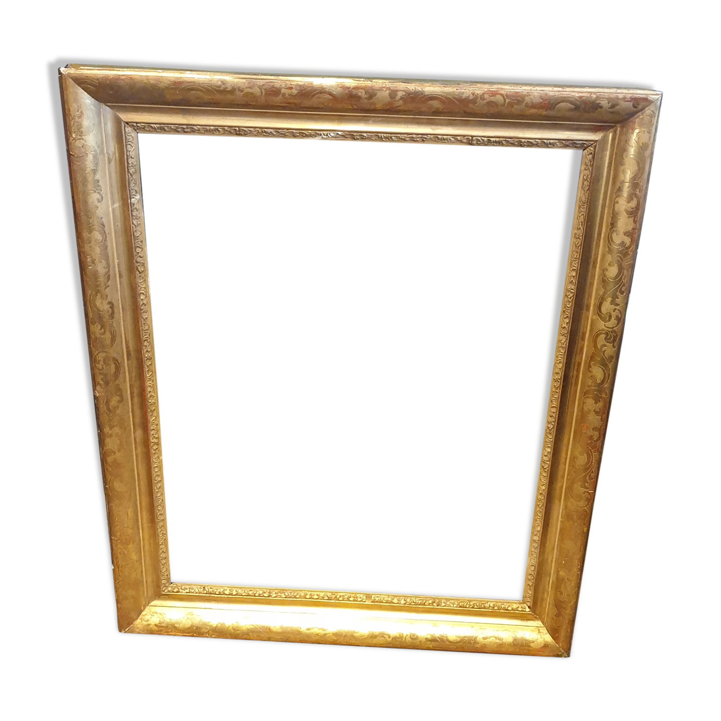 Nineteenth wood frame and gilded stucco