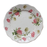 Round dish scalloped in polychrome iron earth decorated with dahlias