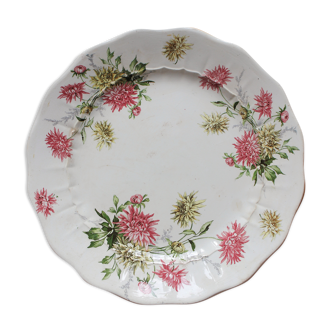 Round dish scalloped in polychrome iron earth decorated with dahlias