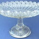Plate mounted on pressed-molded glass column