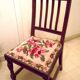 Wooden chair with embroidered seat