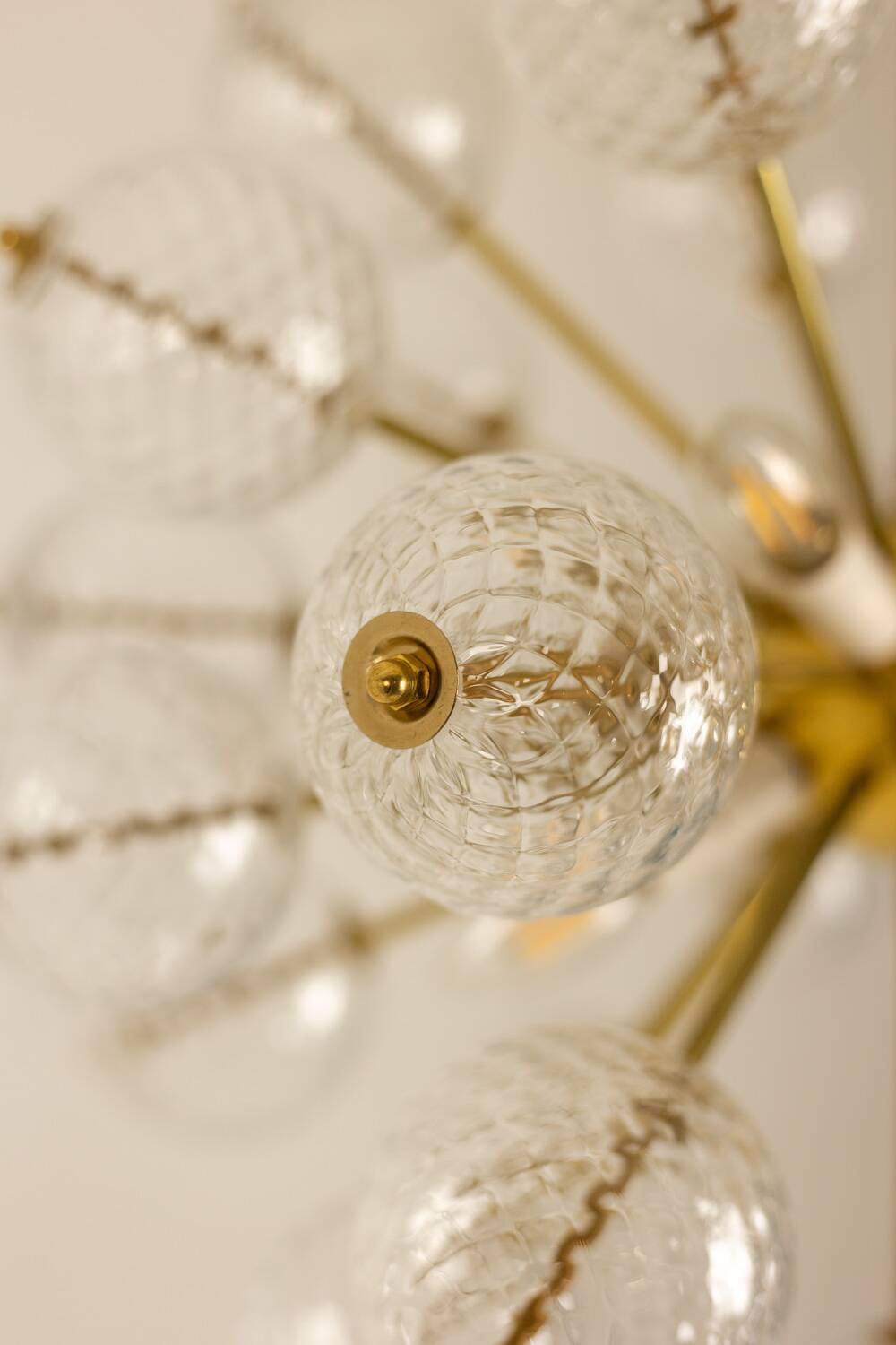 Kamenický Šenov, published by. Brass and glass chandelier. Around 1970.