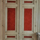 Closet front with double molded doors in patinated wood XX century