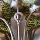 Gold sconces with floral decoration