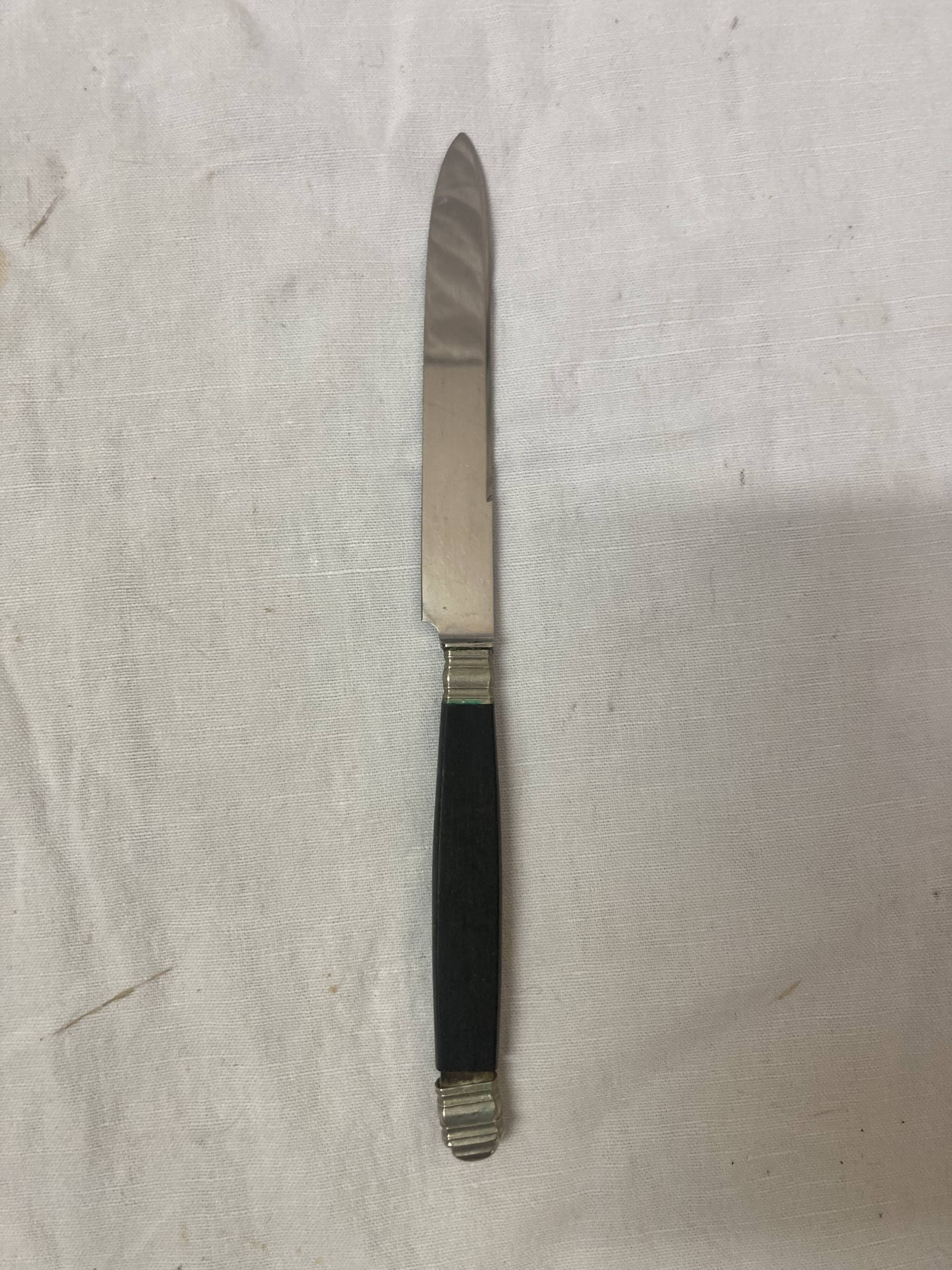 19th century ebony silver cheese knives