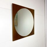 Retro mirror on wood