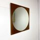 Retro mirror on wood