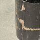 Small side table in black petrified wood with stripes and beige bottom H28.