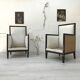 Pair of blackened wood armchairs
