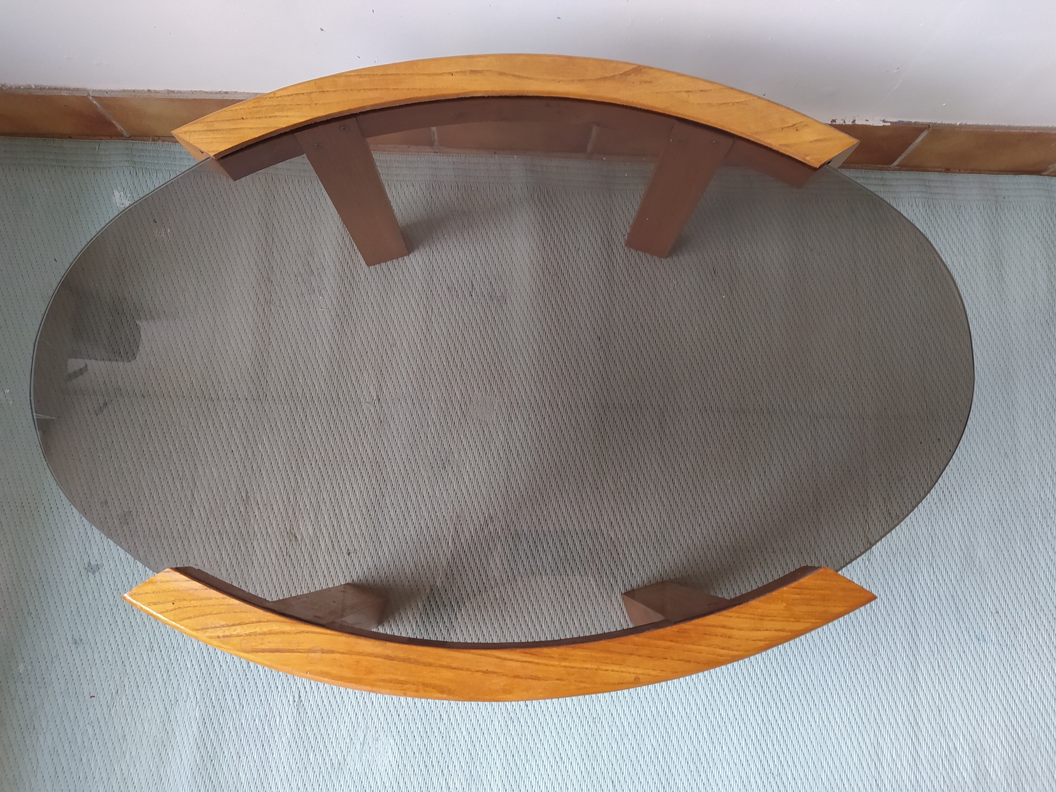 Oval coffee table in elm tray smoked glass