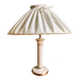 Vintage ivory ceramic lamp with gilding.