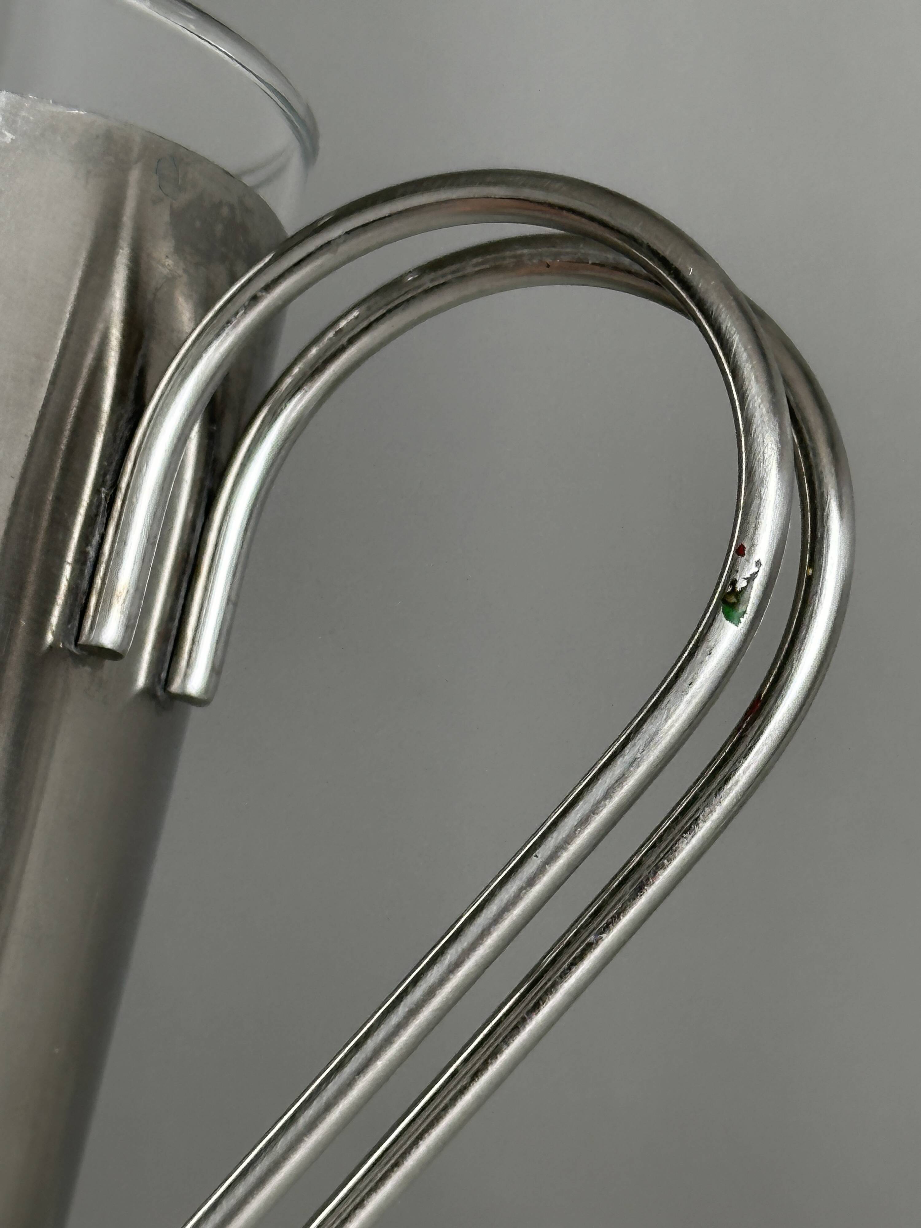 2 glasses with metal handles, stainless steel.