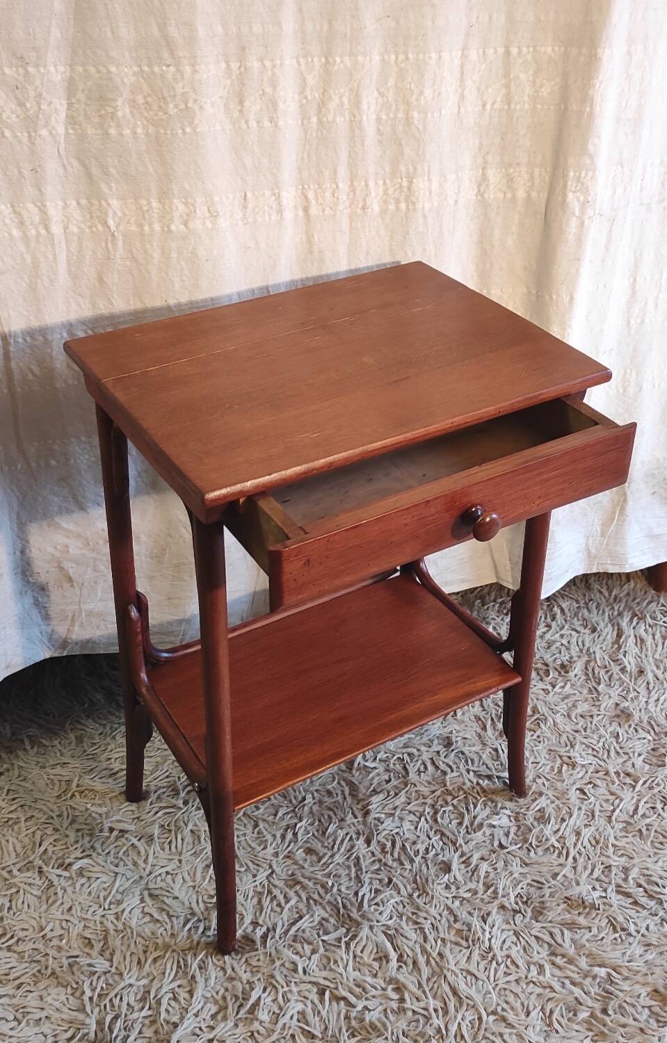 Curved solid wood side table - early 20th century
