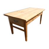 Old rustic farmhouse table made of solid wood.