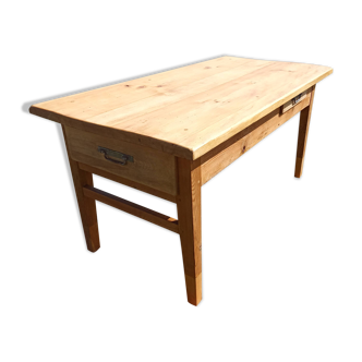 Old rustic farmhouse table made of solid wood.