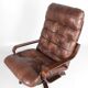Fauteuil vintage en bois et cuir