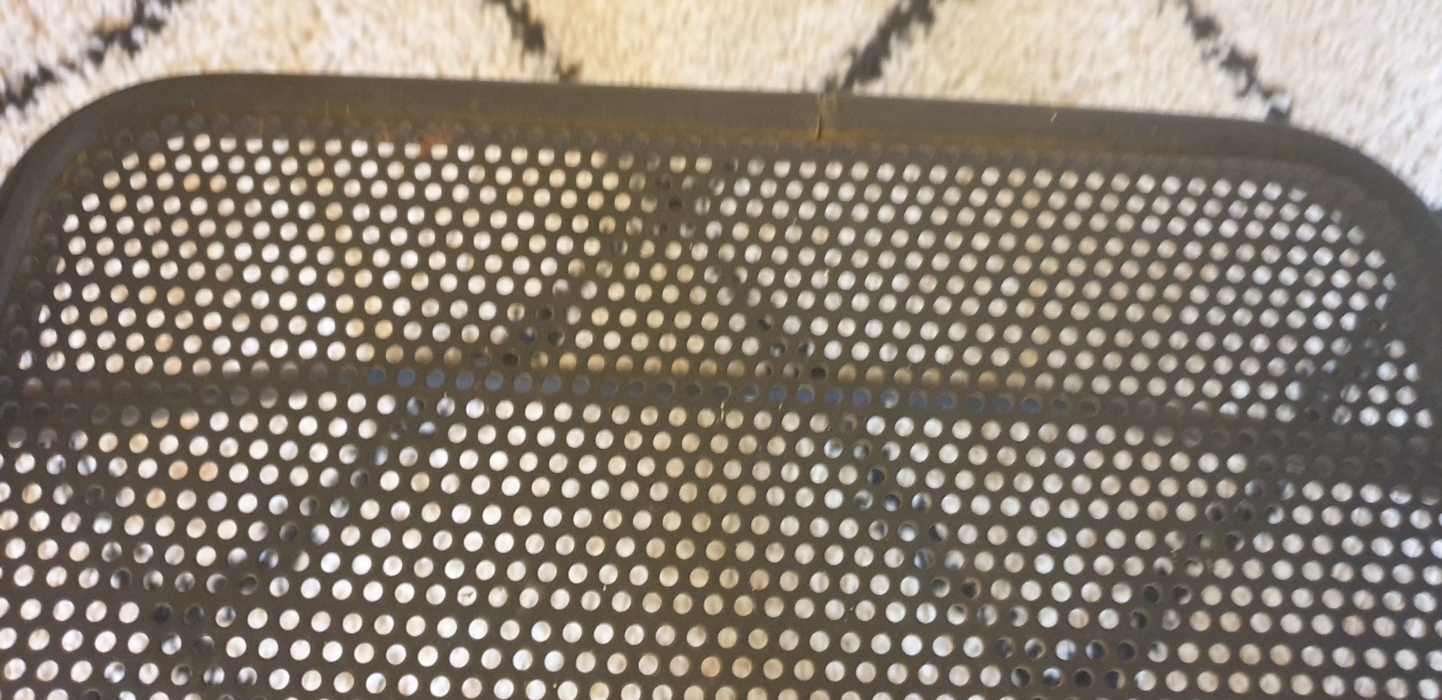 Pair of folding chairs in perforated metal