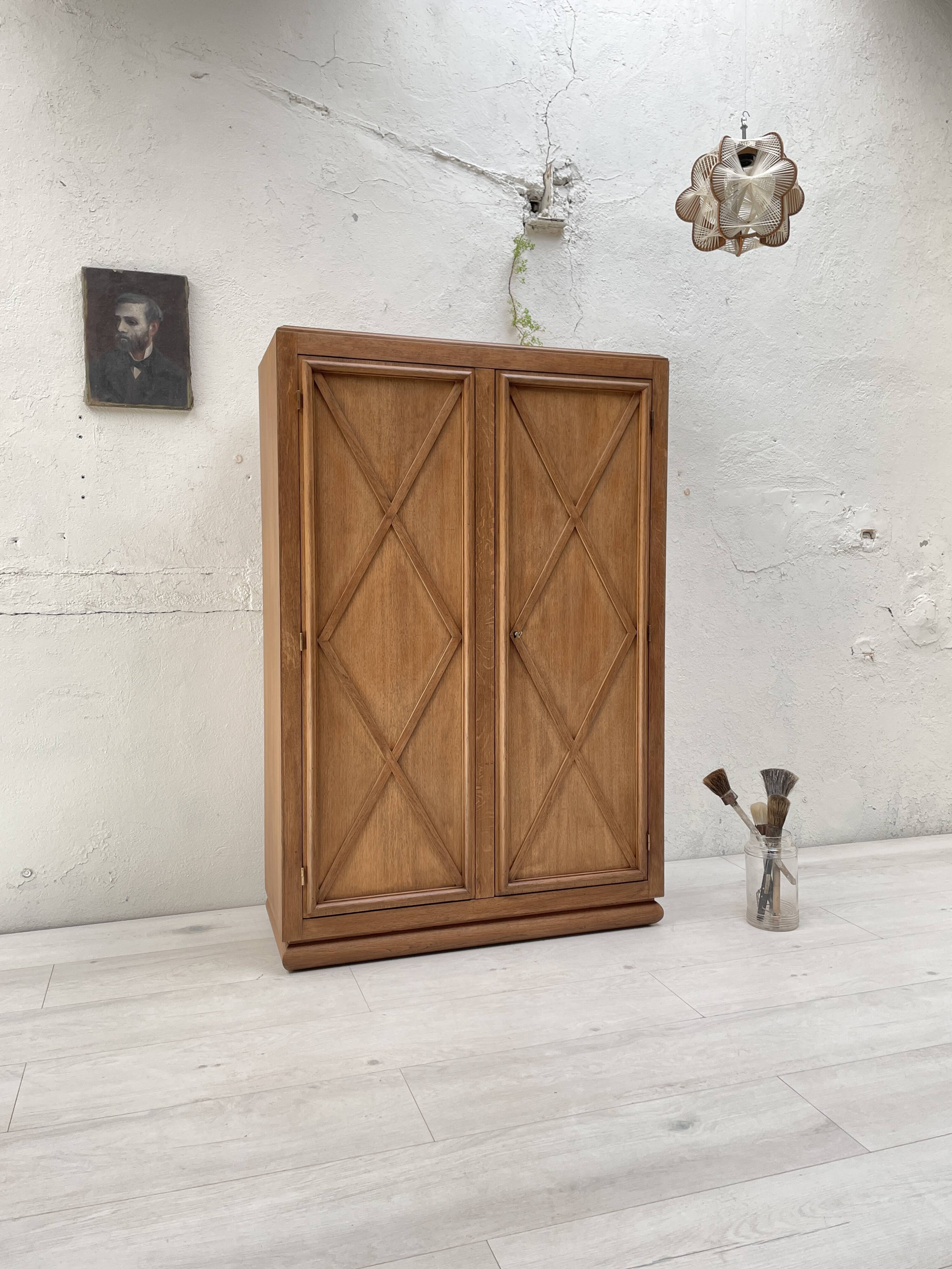 Storage unit in solid oak and veneer, circa 1960.
