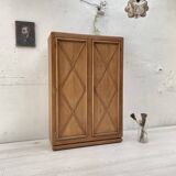 Storage unit in solid oak and veneer, circa 1960.