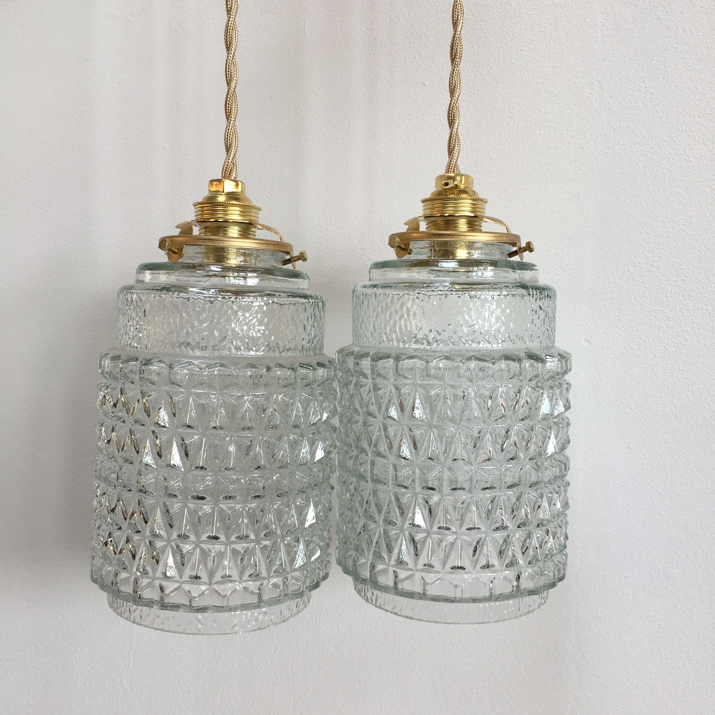 Pair of vintage molded pressed glass pendant lights