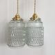 Pair of vintage molded pressed glass pendant lights