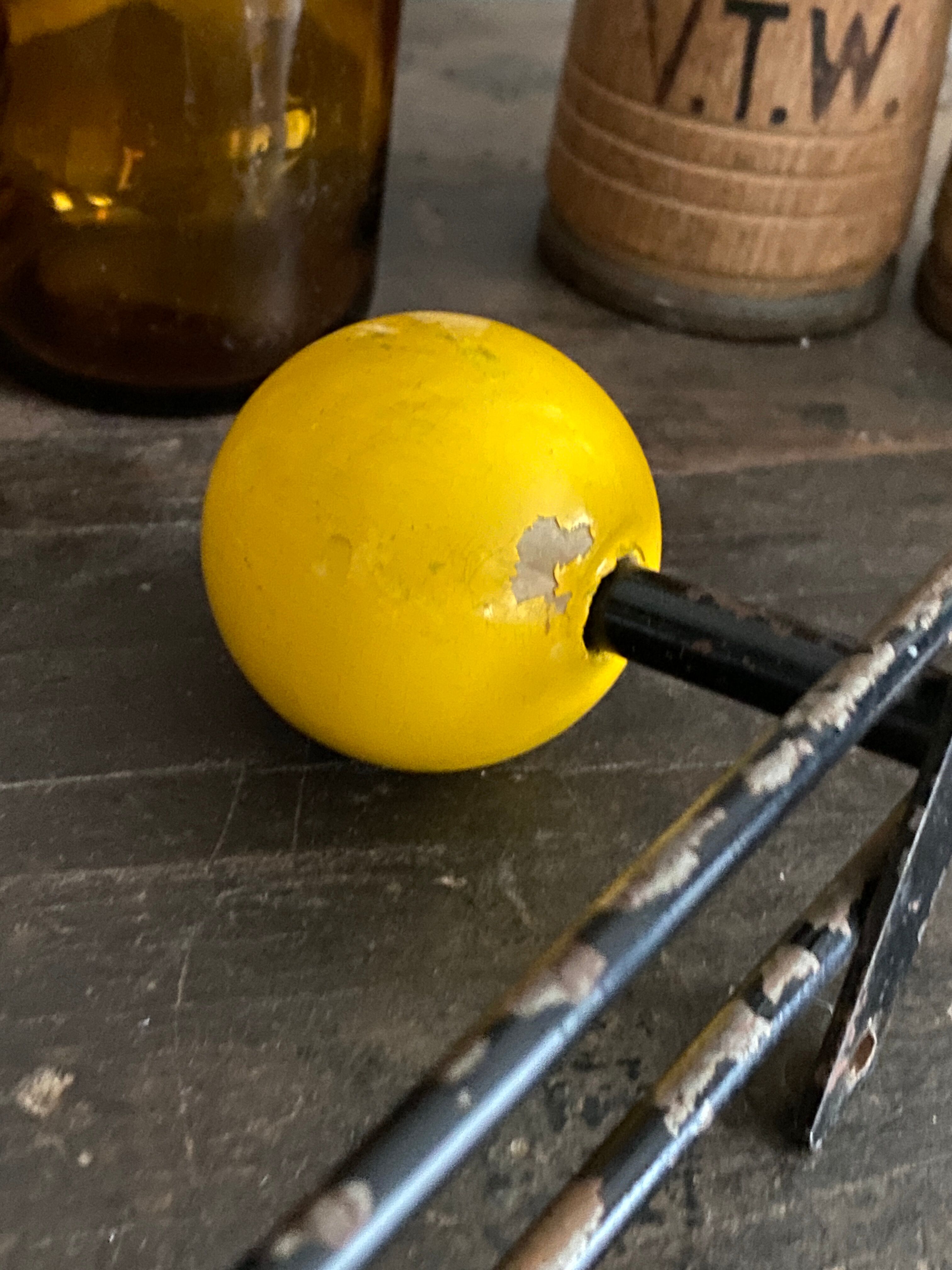 Vintage ball coat rack