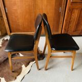 Pair of Scandinavian teak and skai chairs
