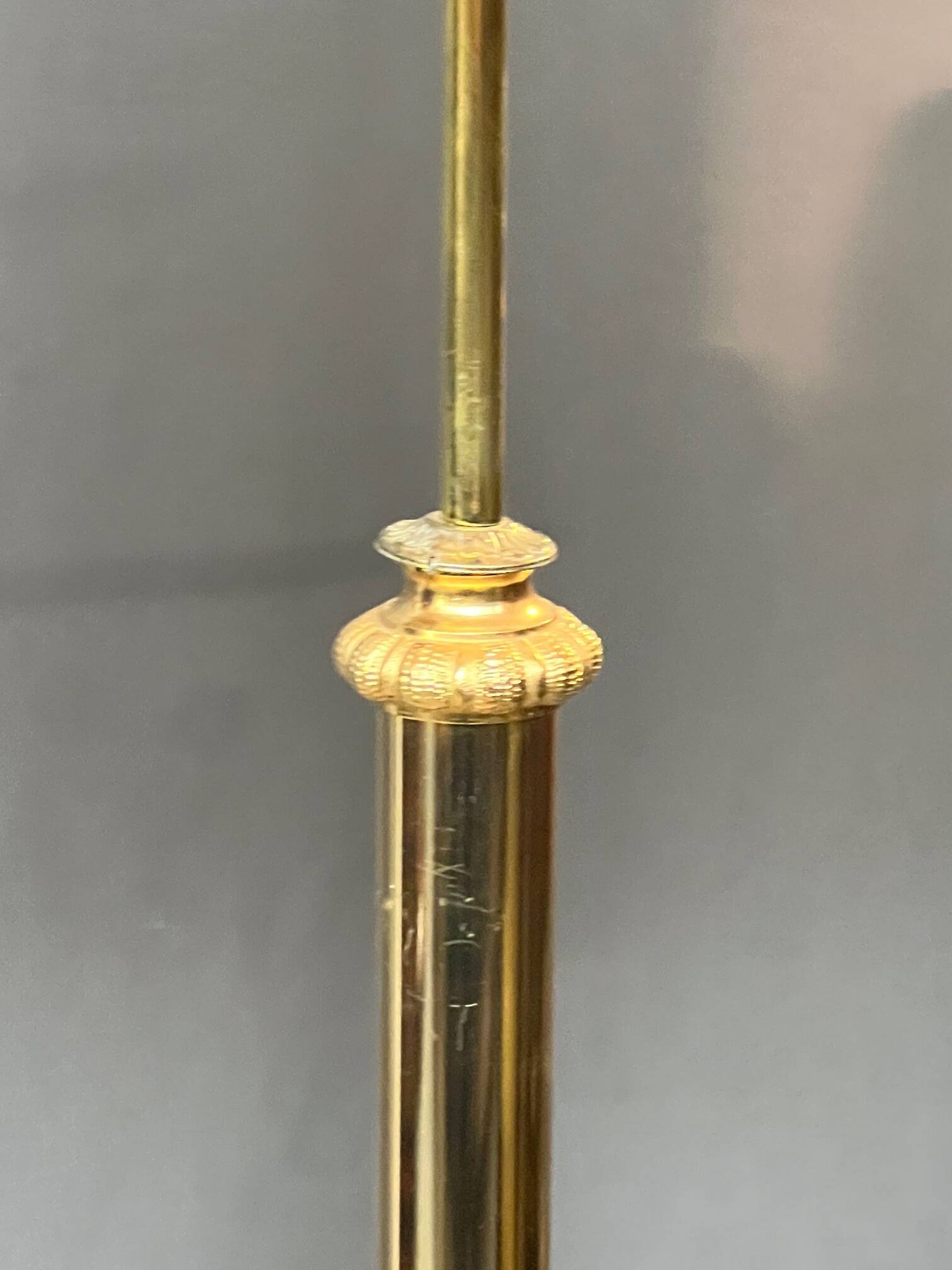Baroque-style floor lamp in solid gilded bronze decorated with crystal pendants.