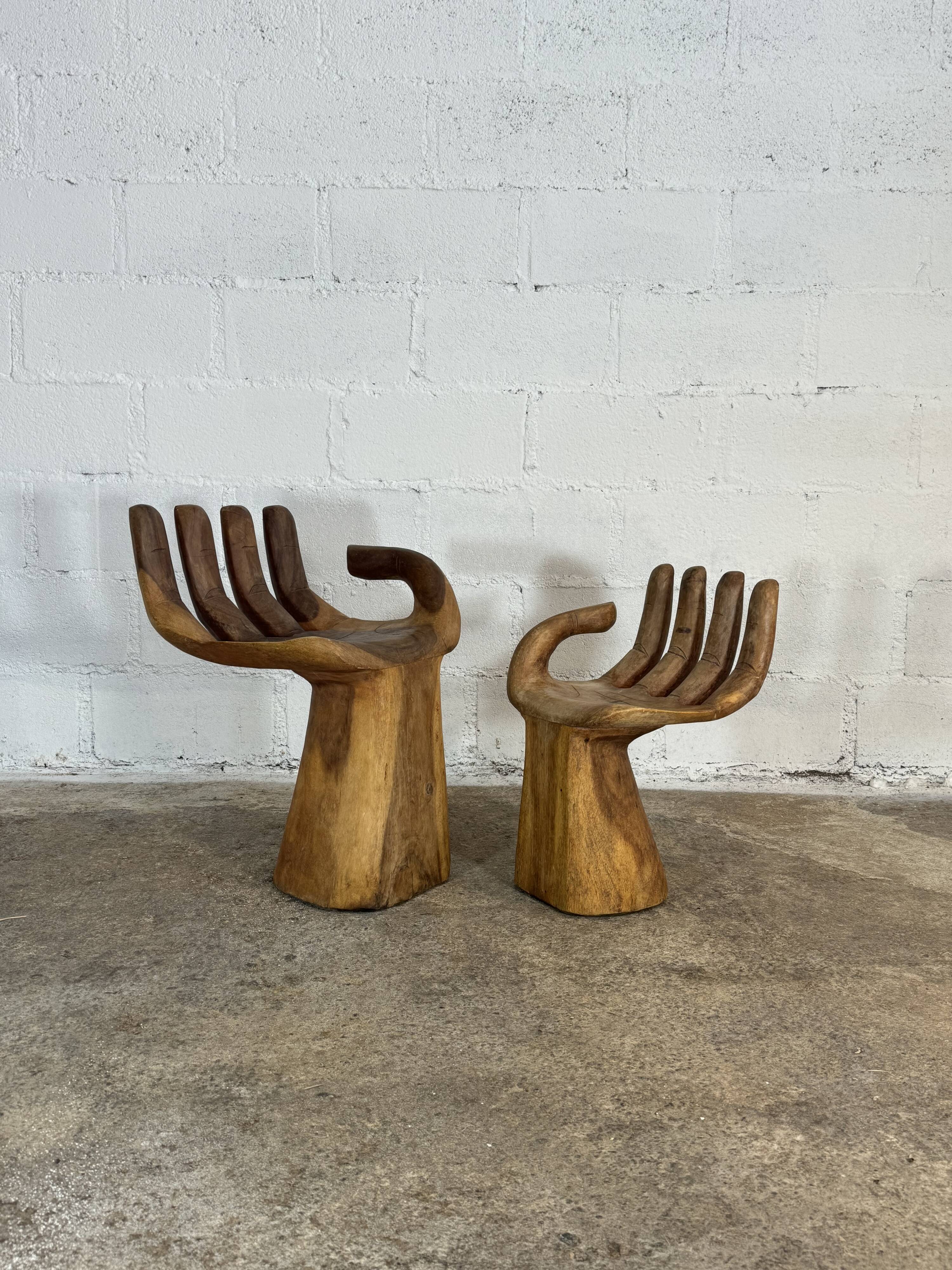 Hand carved chairs in the Pedro Fiedeberg style