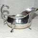 Empire style silver metal sauce boat